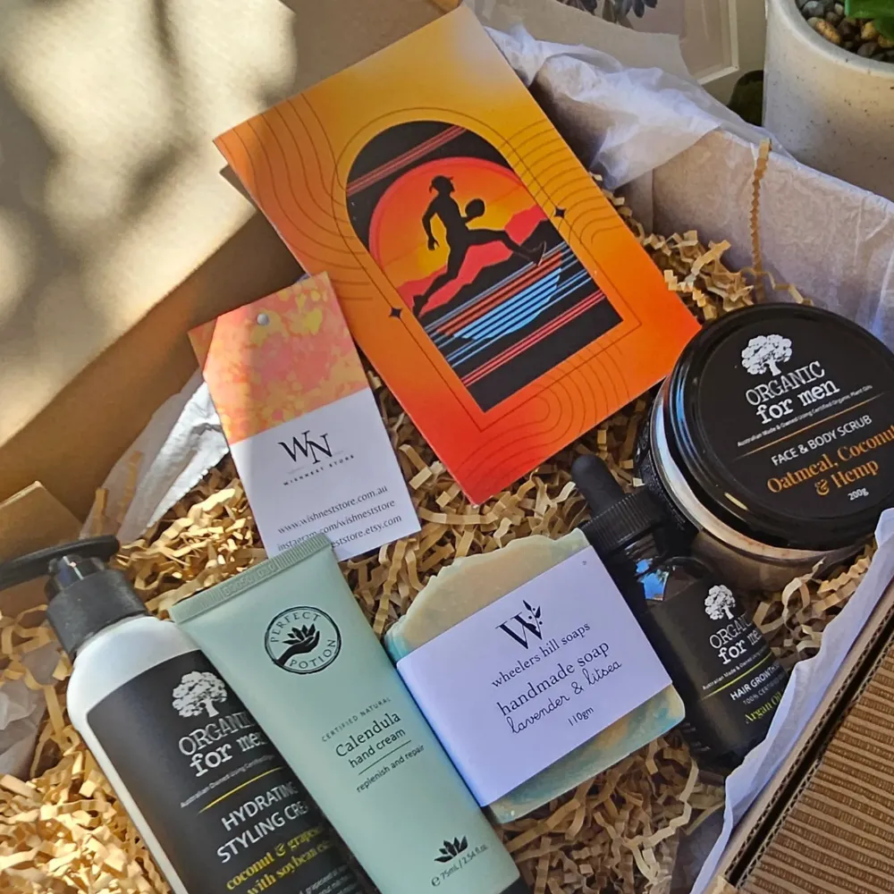 Aesthetic-Self-Care-Gift-Idea-for-Sports-Fans-Eco-Friendly-Grooming-Set Open Footy Fan Men's Grooming Gift Box displaying Australian-made organic skincare and a vibrant footy sports greeting card.