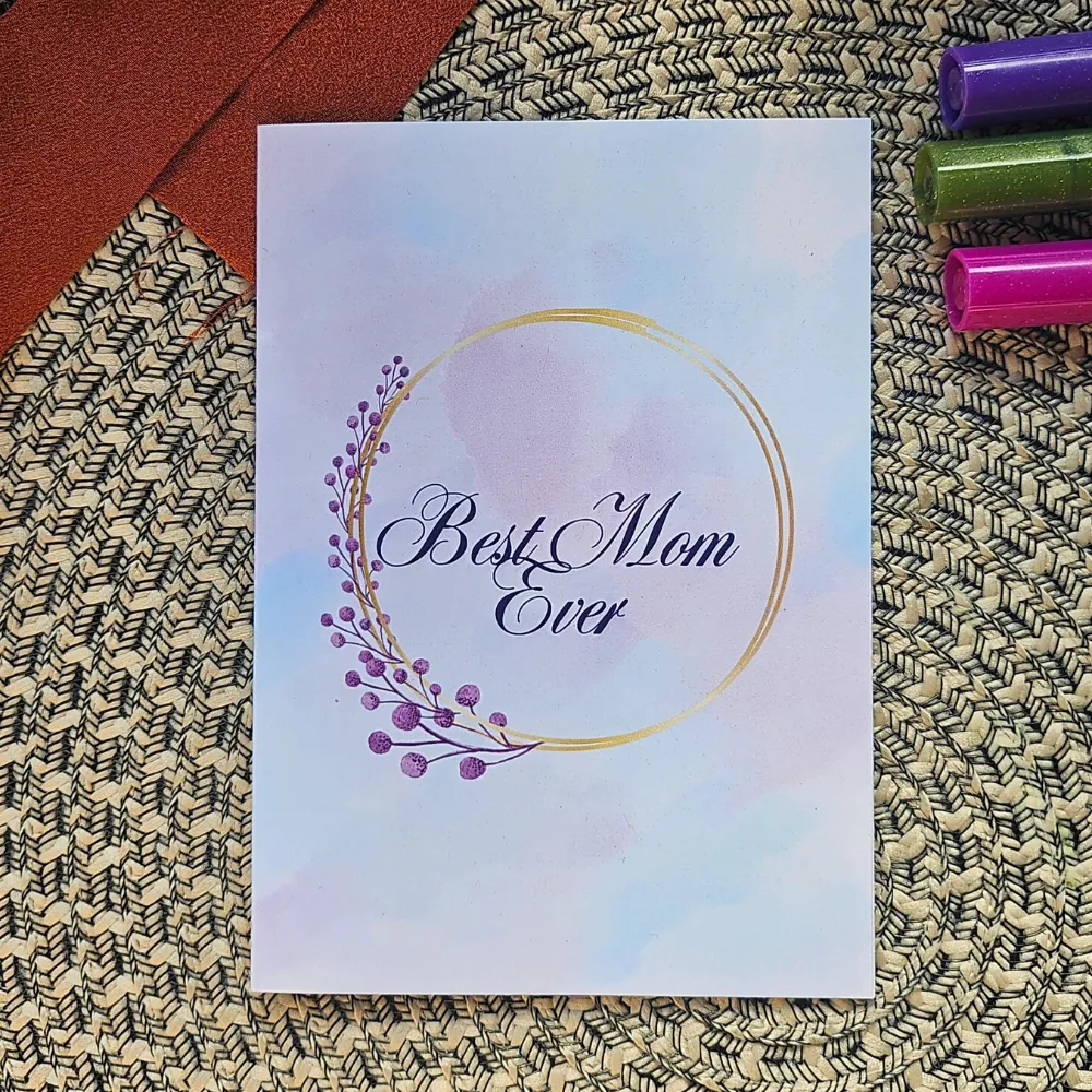 Best Mom Ever Eco-Friendly Greeting Card Best Mom Ever eco-friendly greeting card featuring a delicate gold circle and purple watercolor botanical details on a pastel background.