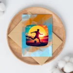 Close up of high-quality matte paper texture on a soccer-themed greeting card with orange and blue tones.