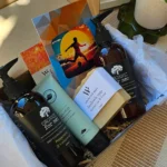 Top-down view of an organic wellness and recovery care package designed for men, featuring Perfect Potion and Organic for Men products.