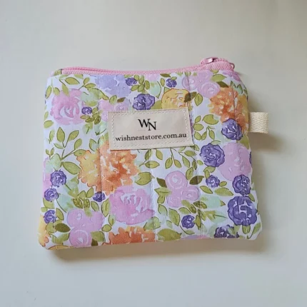 Handmade floral cotton coin purse with pink zip and WishNest Store label