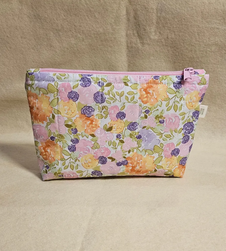 handmade-quilted-floral-pouch handmade quilted pink floral makeup pouch with zipper